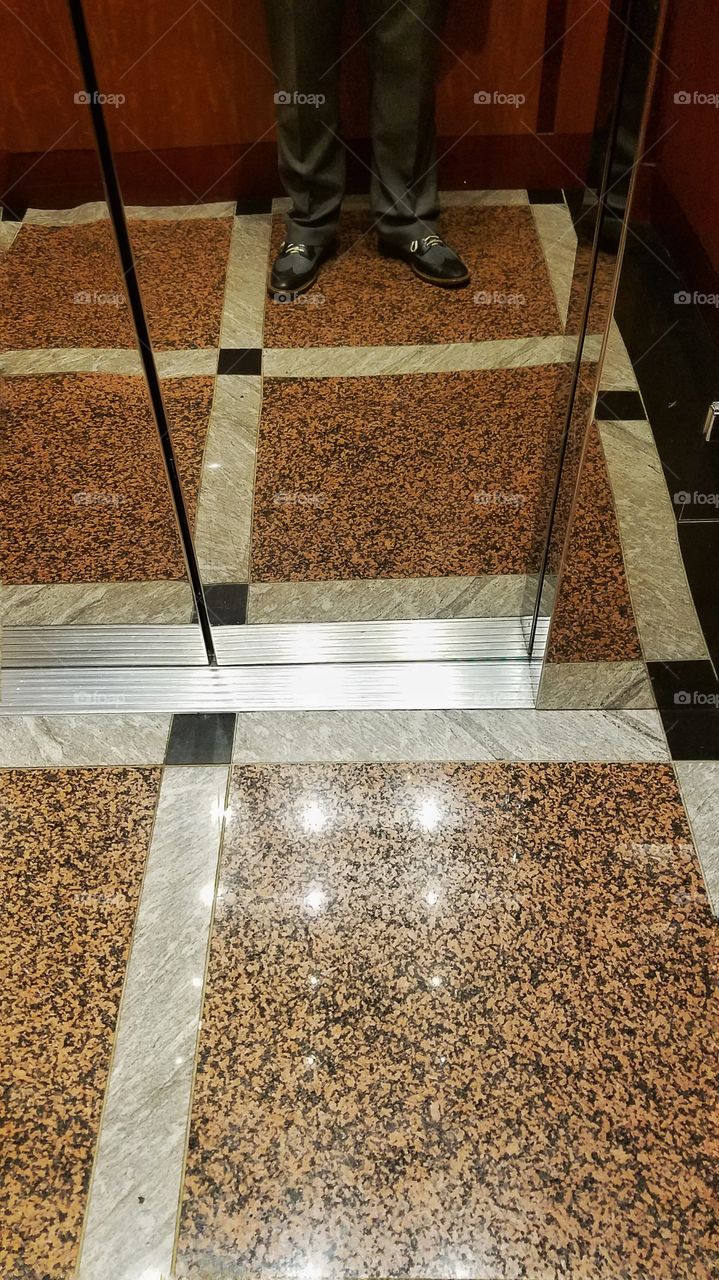 Standing in an Elevator