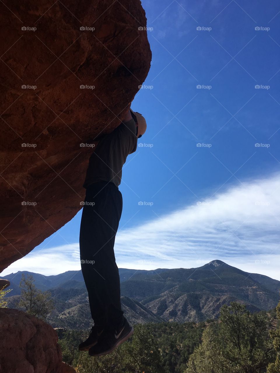 climbing a huge rock