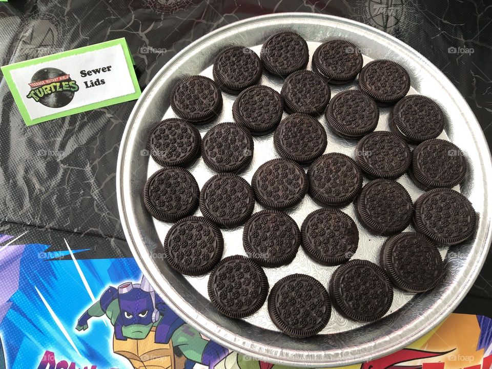 TMNT themed birthday party food with Oreos as sewer lids