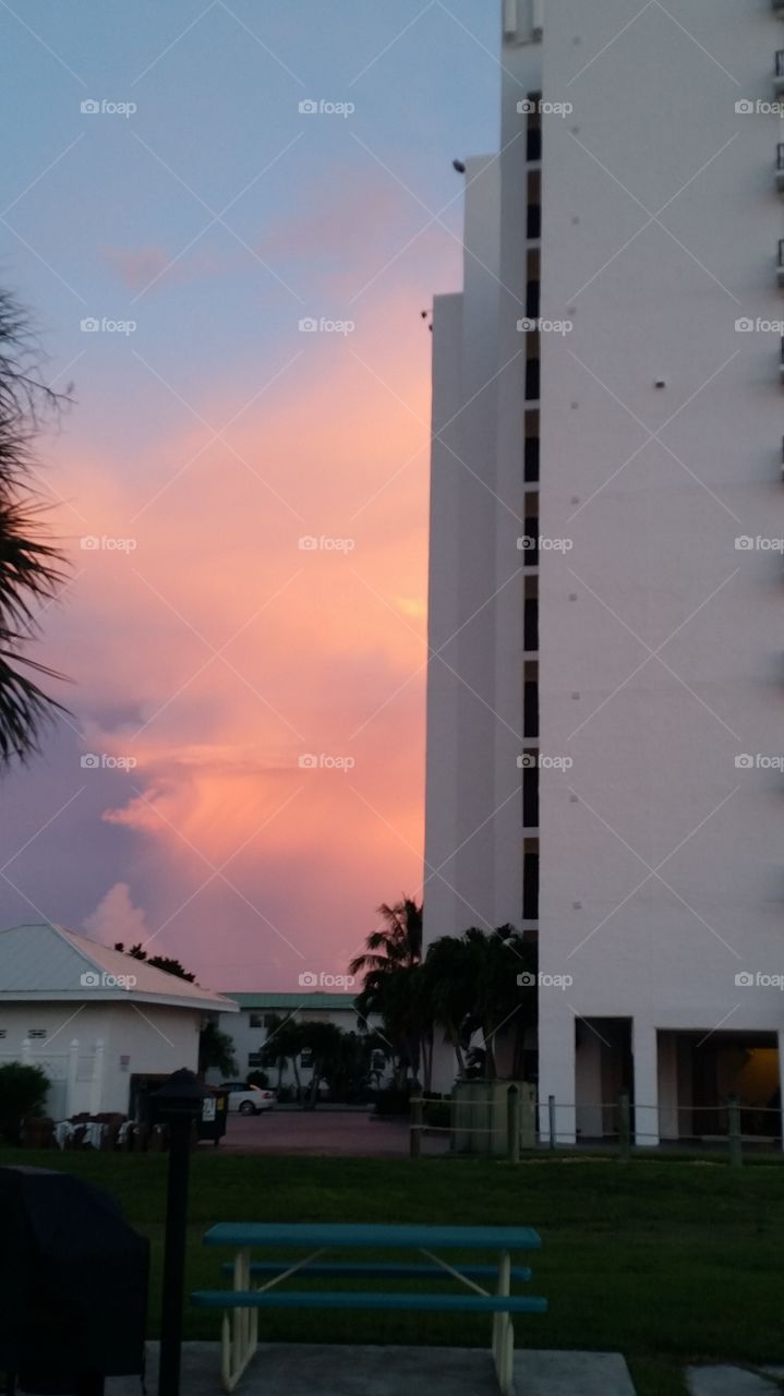 pink clouds next to resort