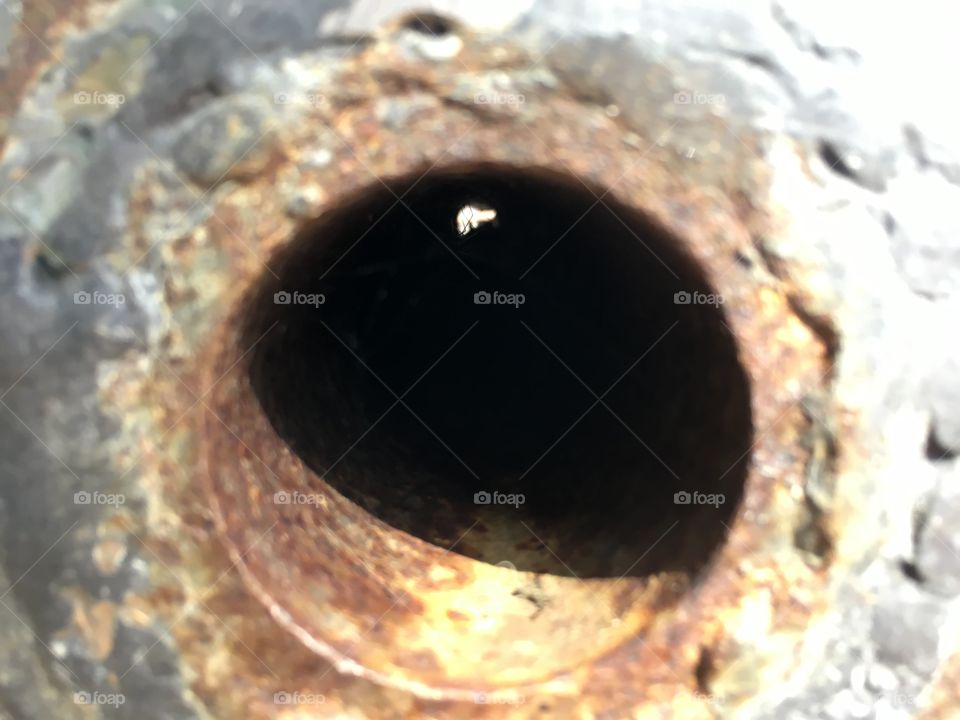 Through a canon at the Fountain of Youth in St Augustine Florida 