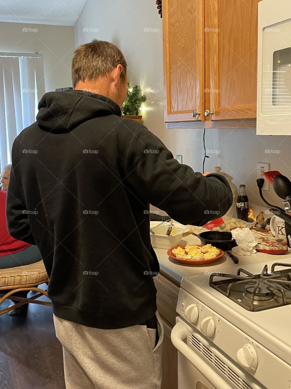 Man preparing deviled eggs