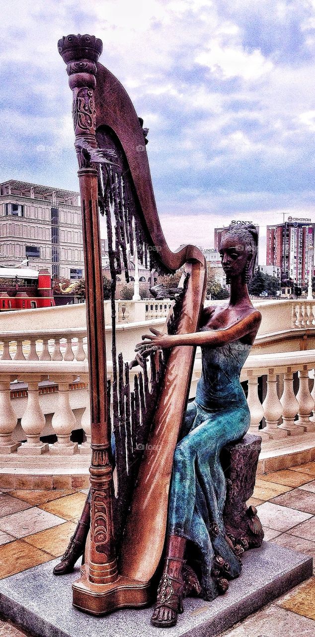 Musician with harp