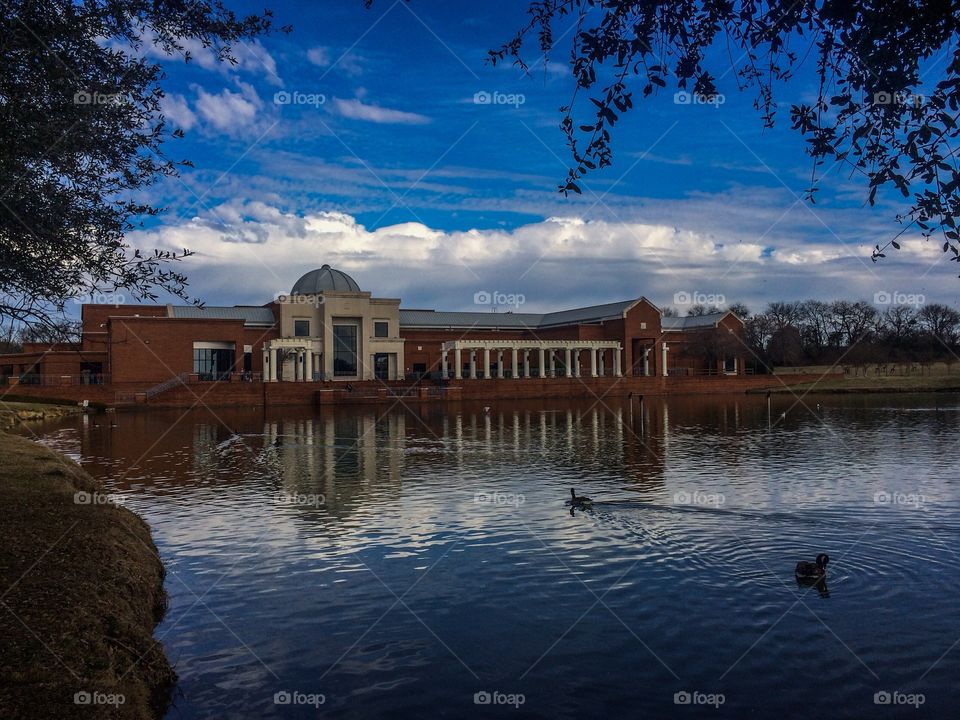 View of a government building near pond