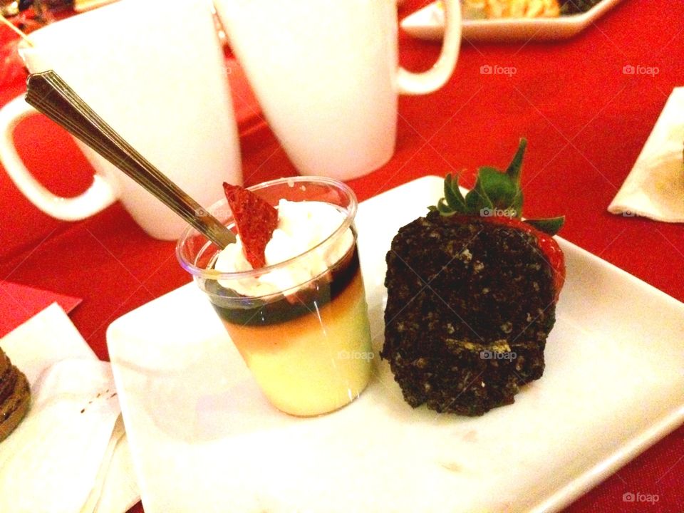 Indulgence #1. A plate of dessert. Chocolate strawberry and pudding.