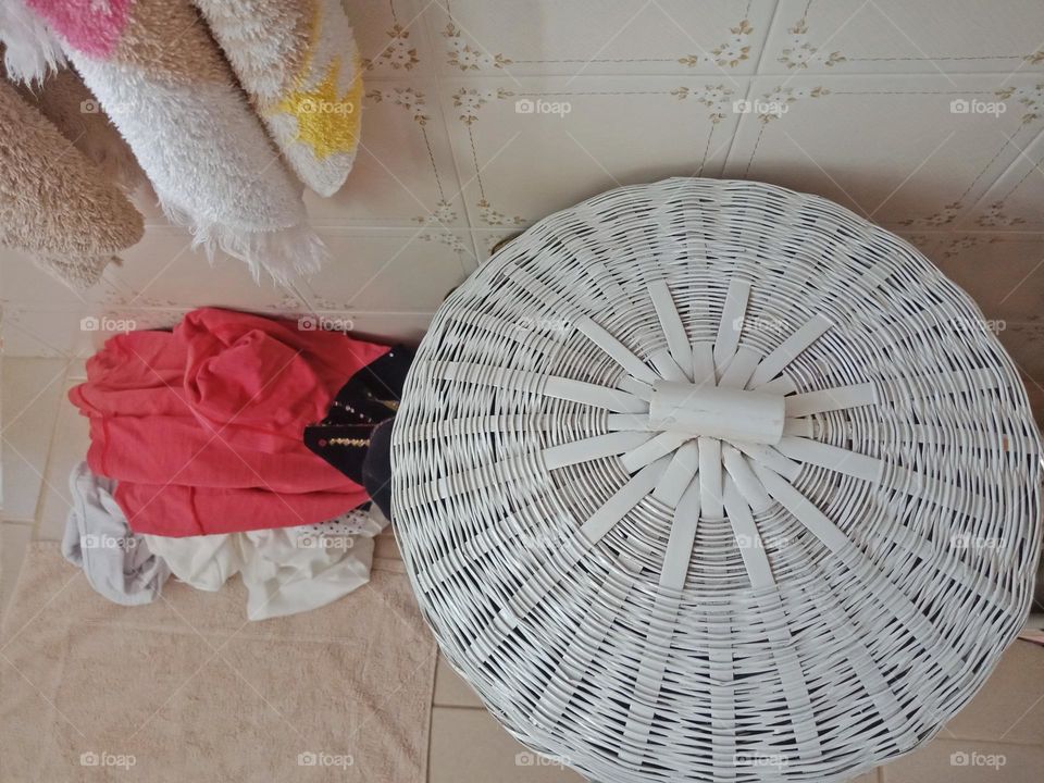 Laundry basket lid in a bathroom