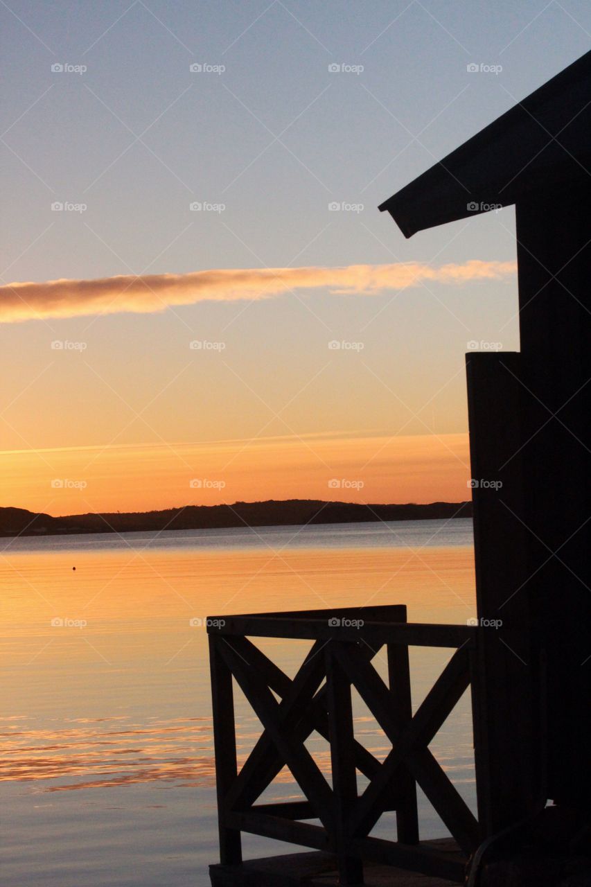 Boathouse in the sunset