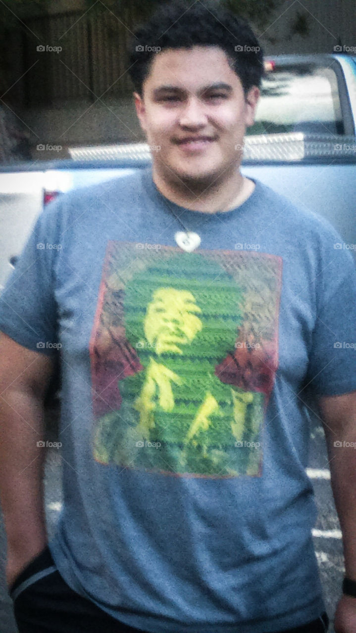 Man with Bob Marley shirt on