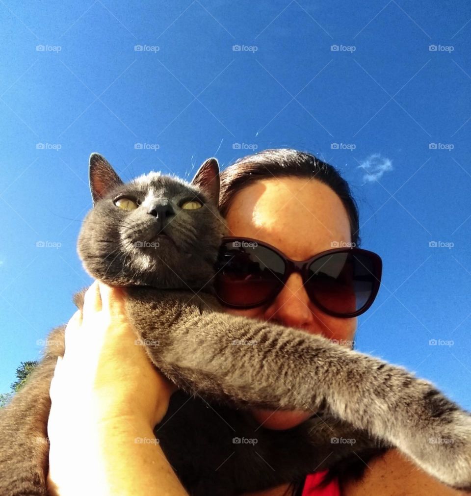woman holding a lovely cat