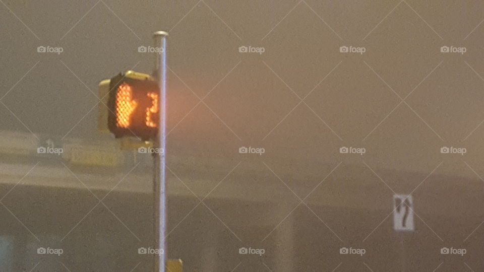 foggy crosswalk signal