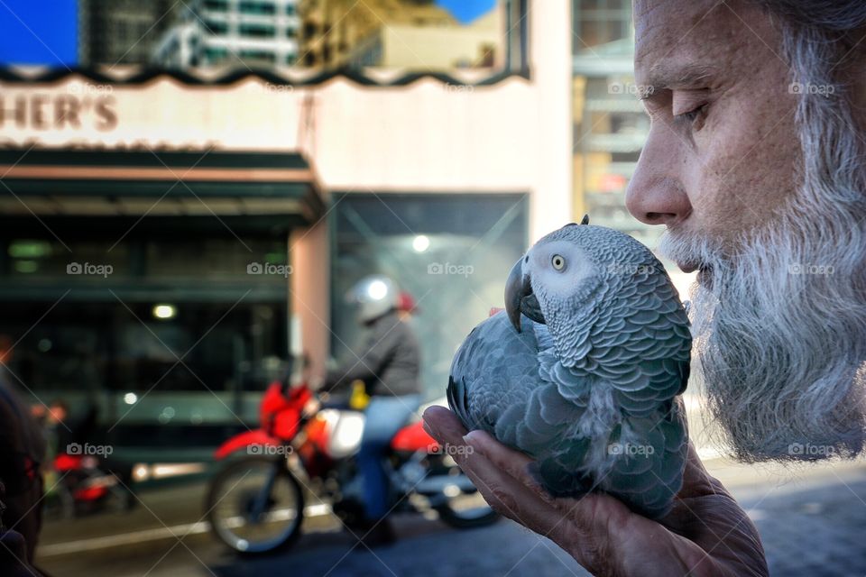 A Man and His Parrot