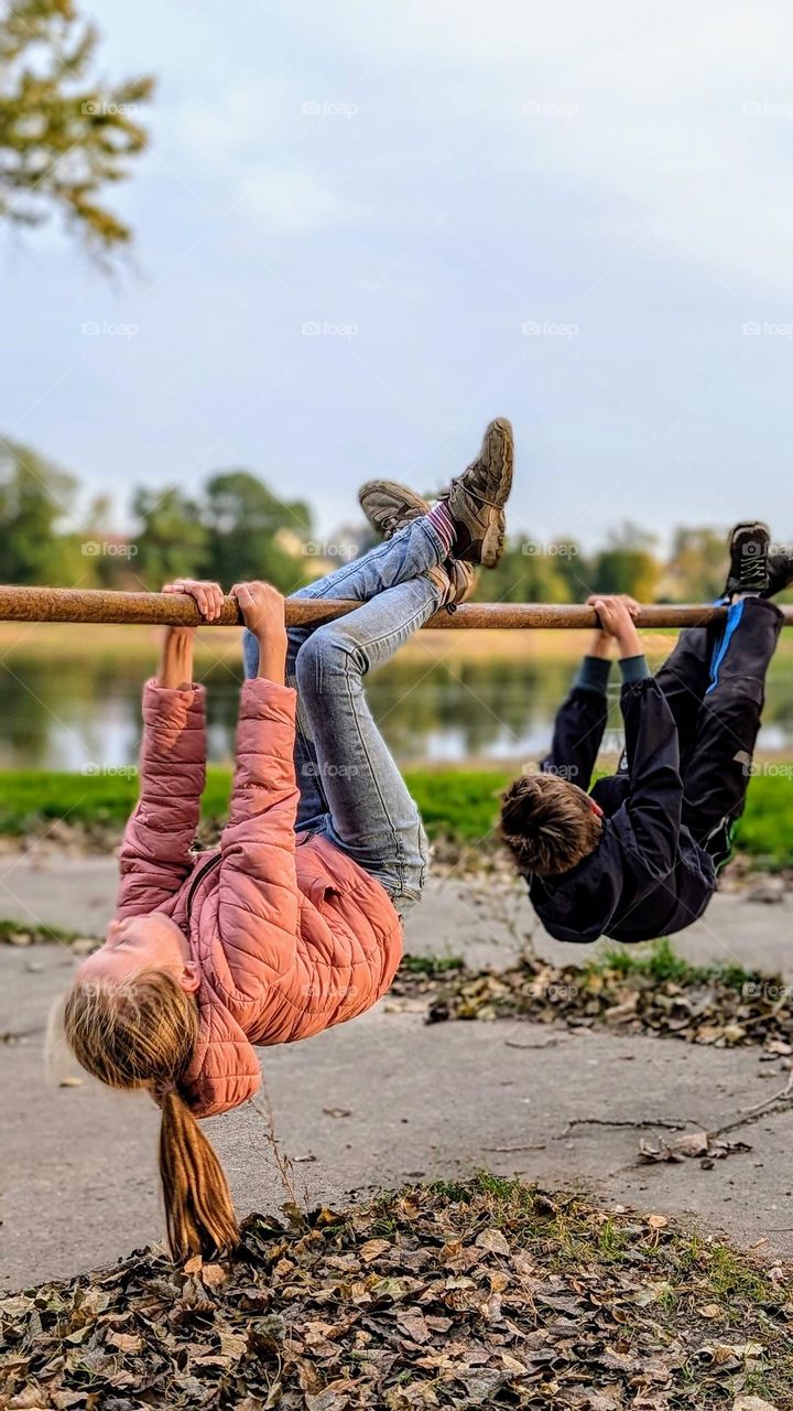 Siblings playing in the fresh autumn air