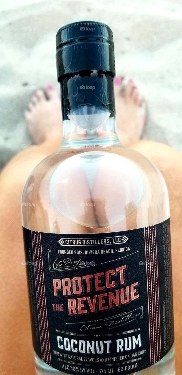 Two best friends: coconut rum and the beach