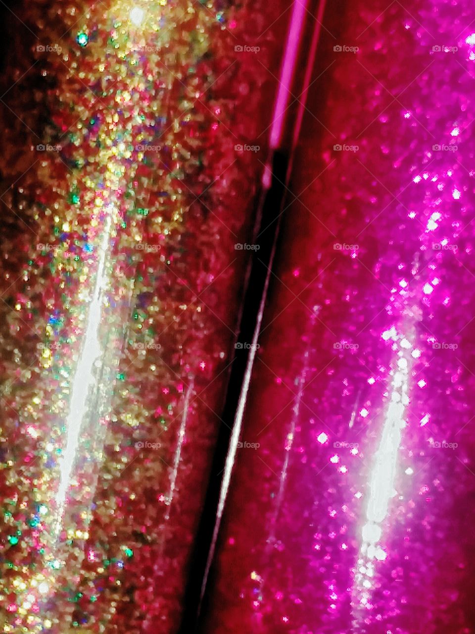 Close-up of Tubes of Glitter Glue (gold flecked and pink)