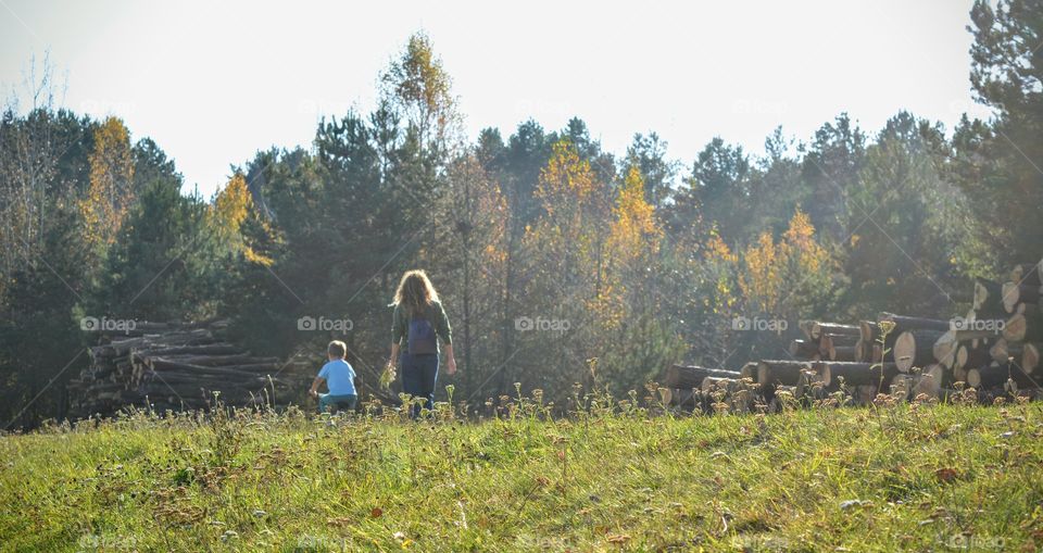 family walking outside, nature landscape, social distance