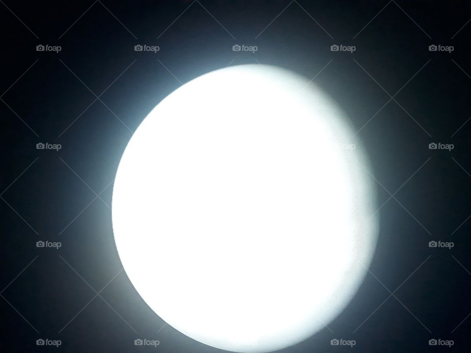 One of the most beautiful creation of our creator the full moon in the darkness of the immense universe.