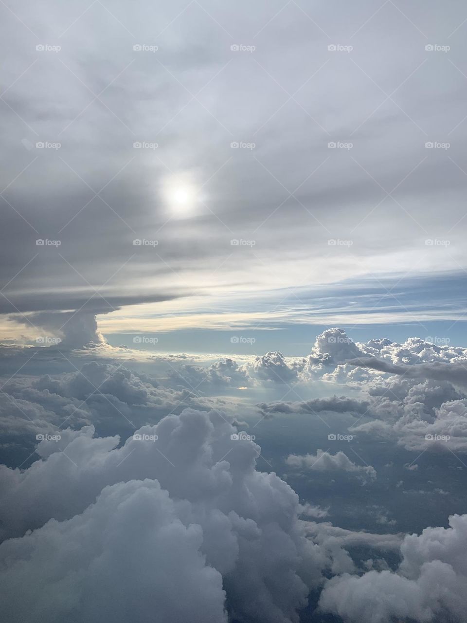 My view from my plane, in awe of the clouds - up in the air so high. {Heading to - Savannah, GA}