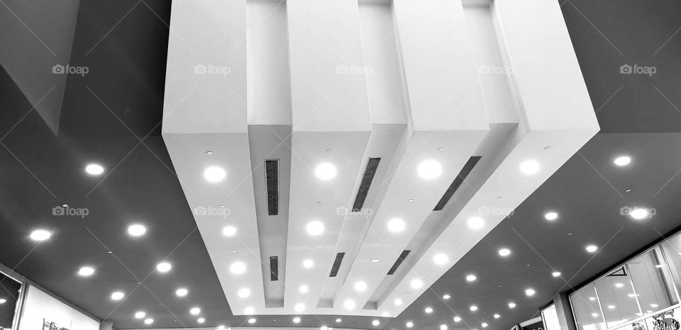 striking shape and color roof of the Los Aviadores shopping center