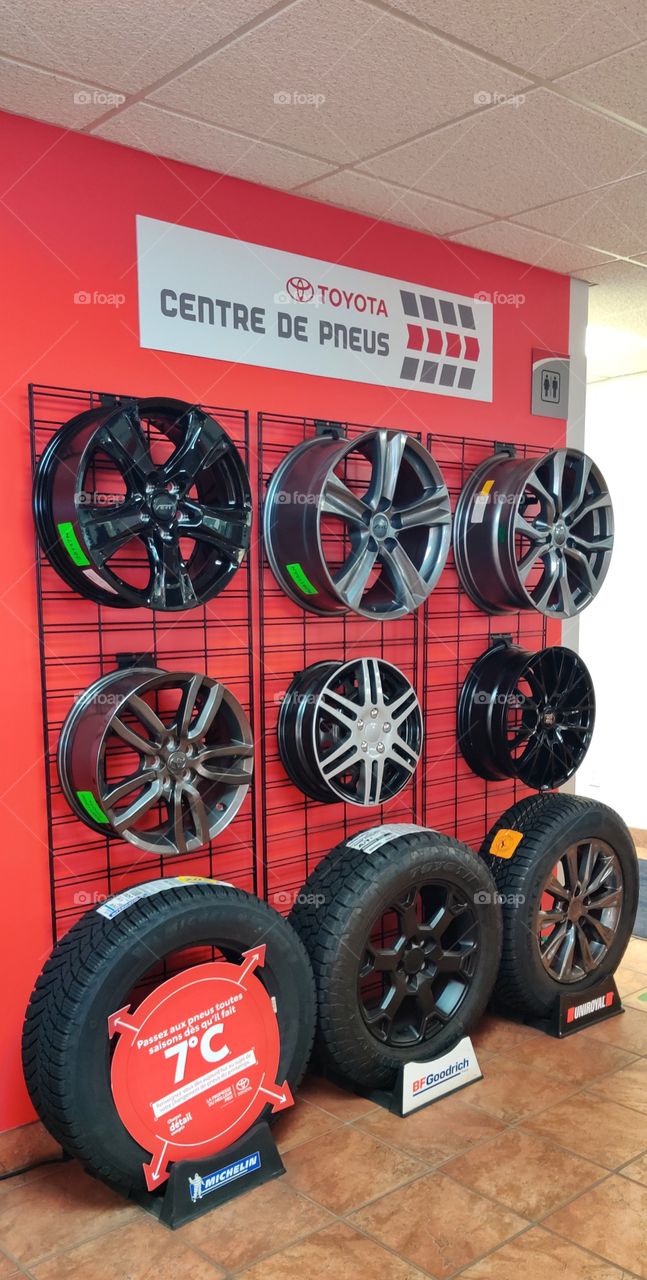 a wall with disks and tires