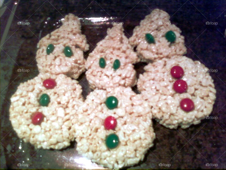 Rice Crispy treats snowman with m&m's buttons