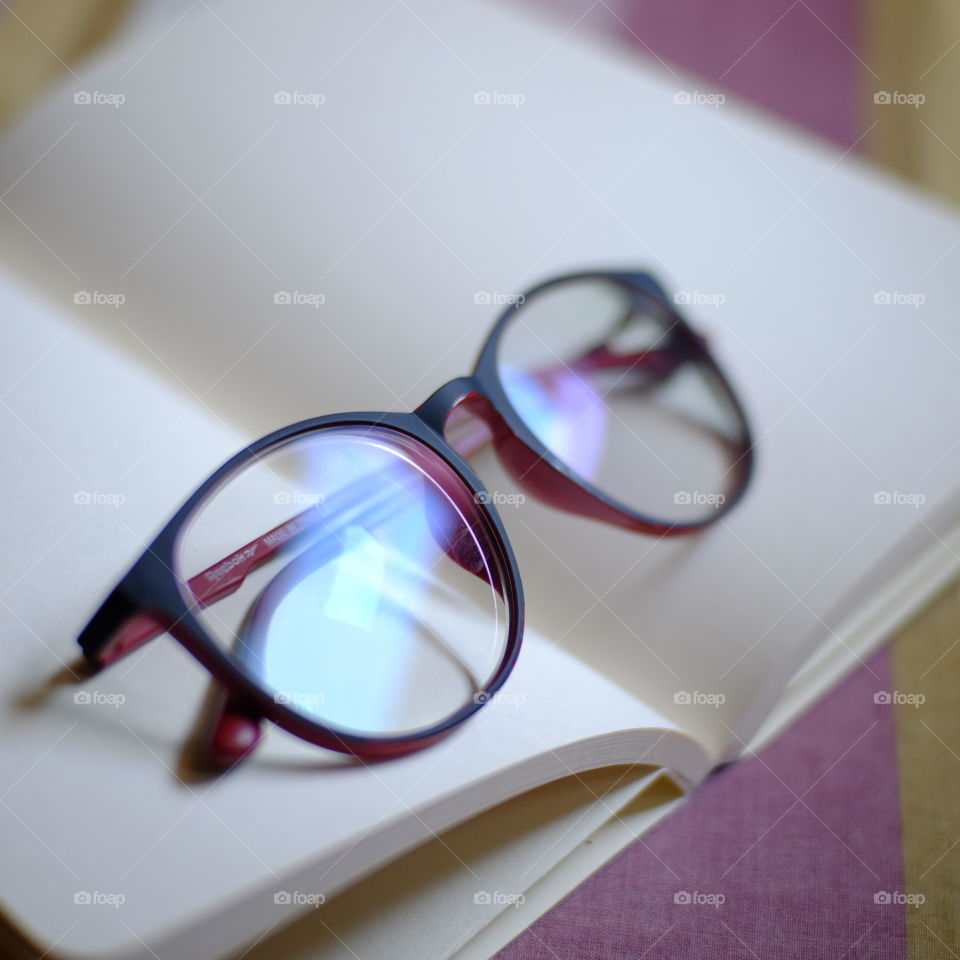 Glasses on a book