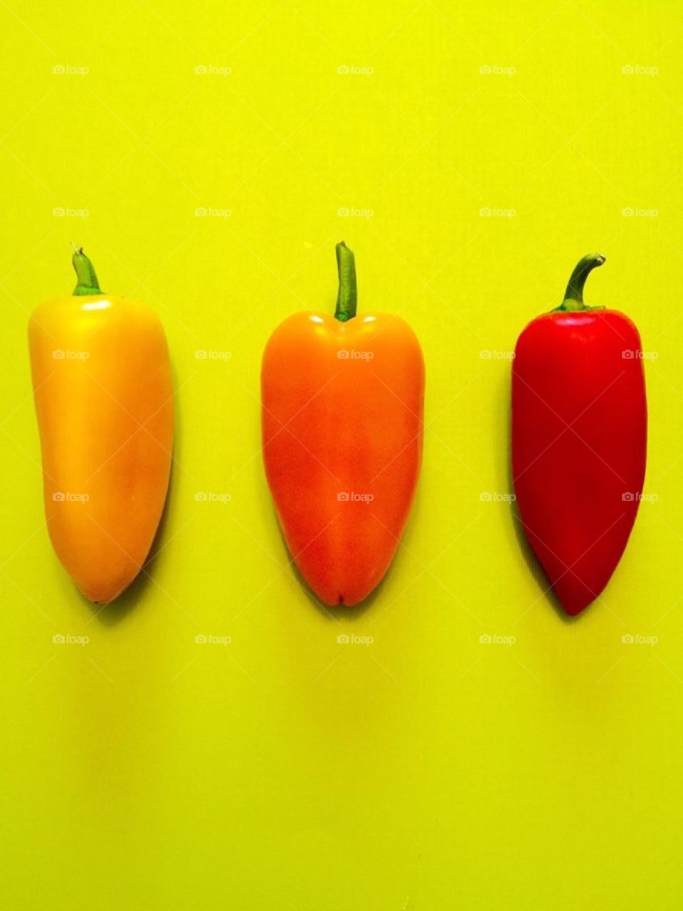 Peppers on Bright Yellow