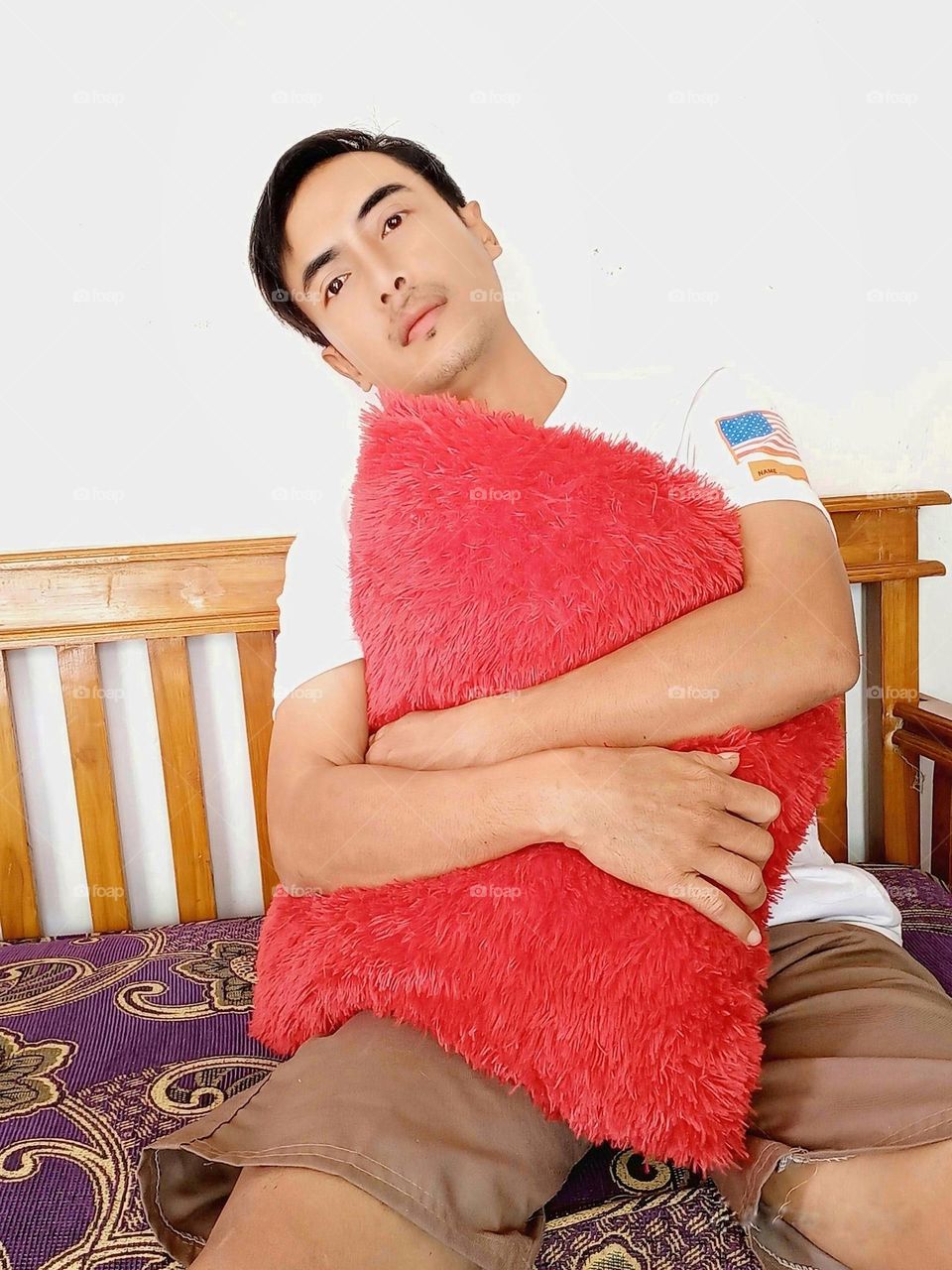 Hug the pillow as hard as you can