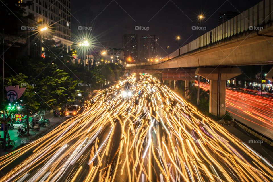 Rush hour in Hanoi city, Vietnam on long exposure 