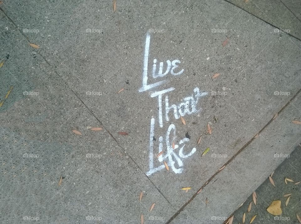 Painted Text on Sidewalk