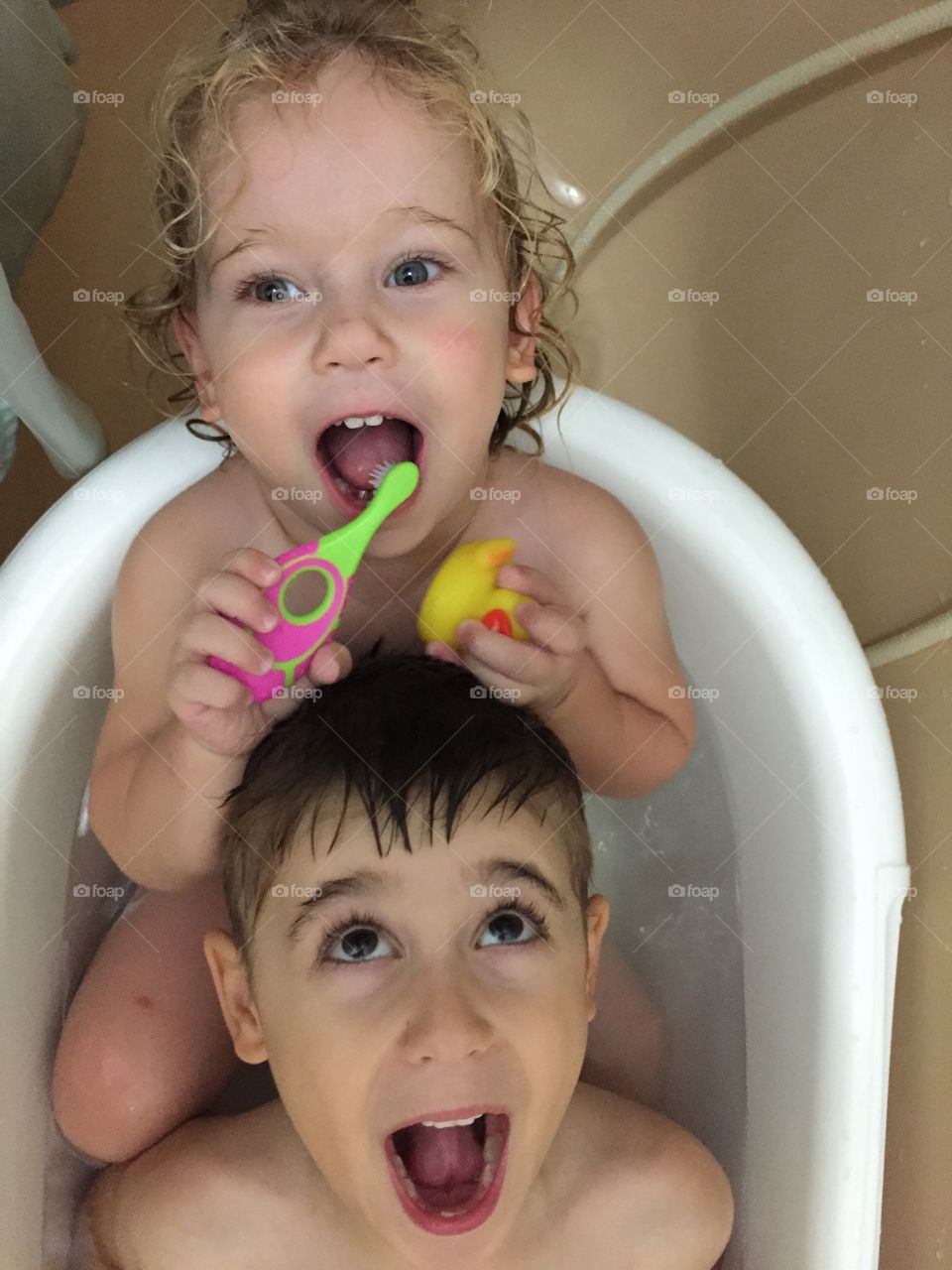 Kids take a shower 