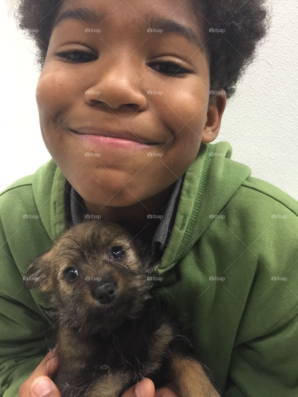 Cute kid and his puppy 