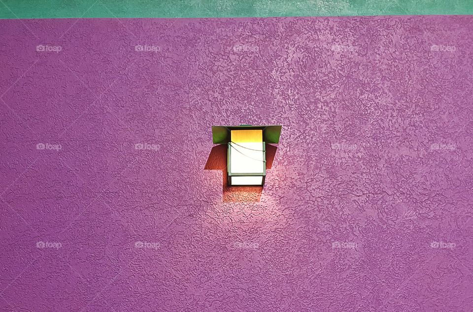 Light on purple wall