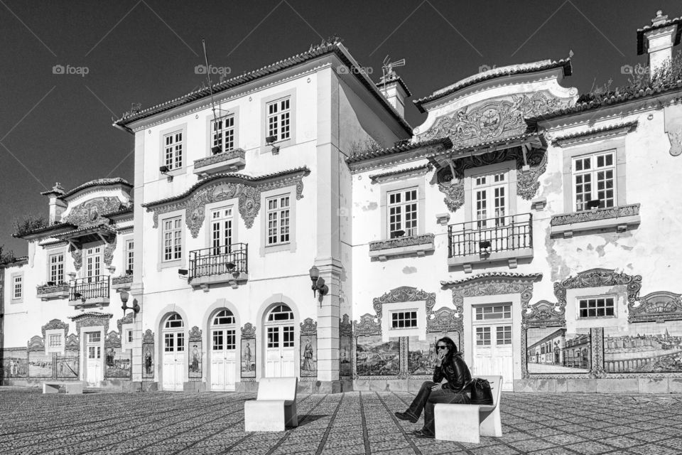 Man sitting on bench and smoking