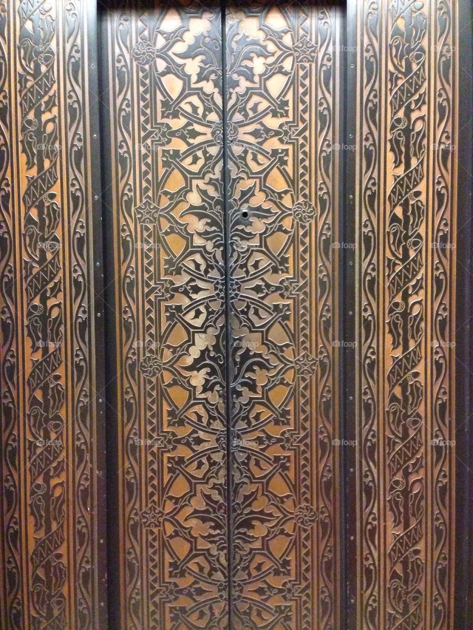Texture detail on elevators of Woolworth Building.