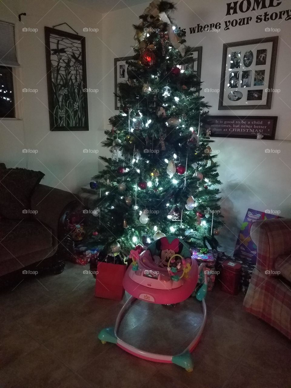 Christmas Tree surrounded with presents and decorations on Christmas Eve