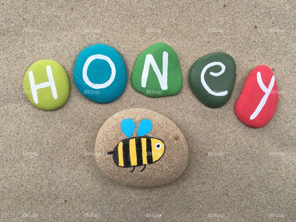 Honey, organic food concepton stones design