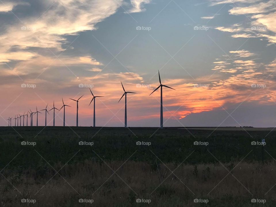 Kansas sunset with windmills 