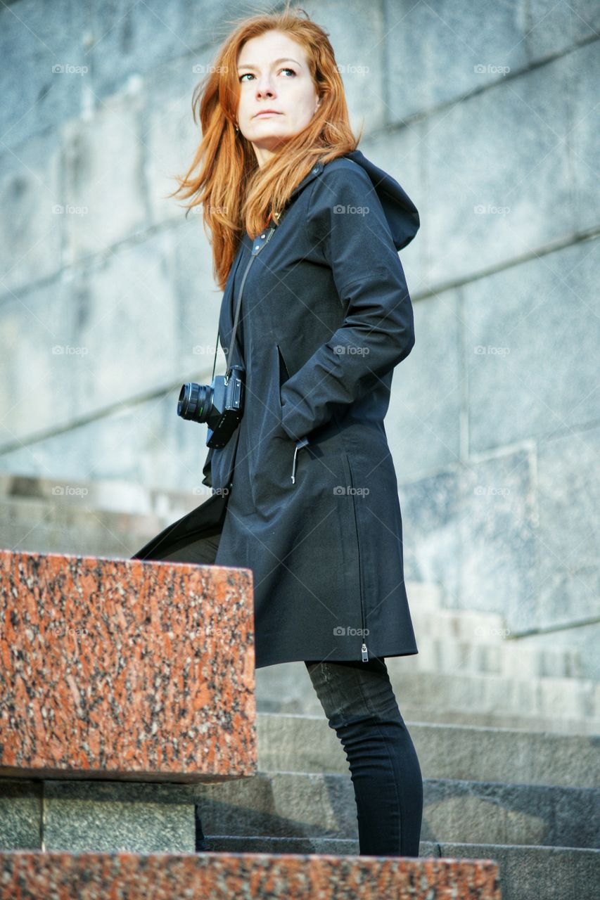 red hair, blacj cape