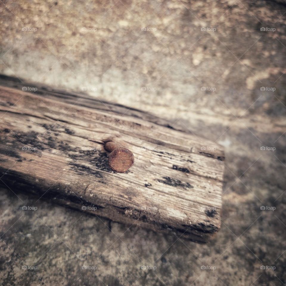 rusty nail in wood