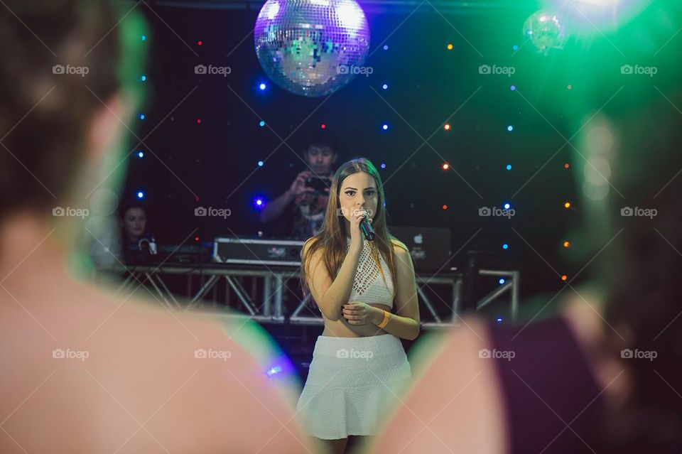 Girl singing on a party