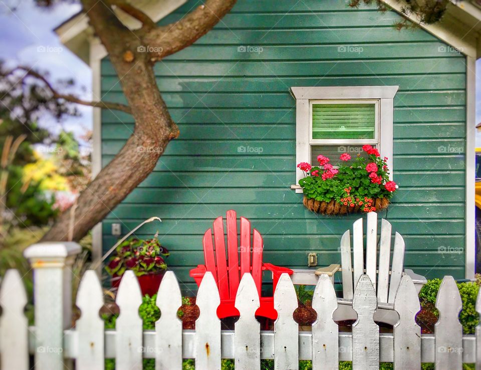 Best Shot Mission, Island Cottage With Adirondack Chairs, Picket Fence and Baskets of Flowers 