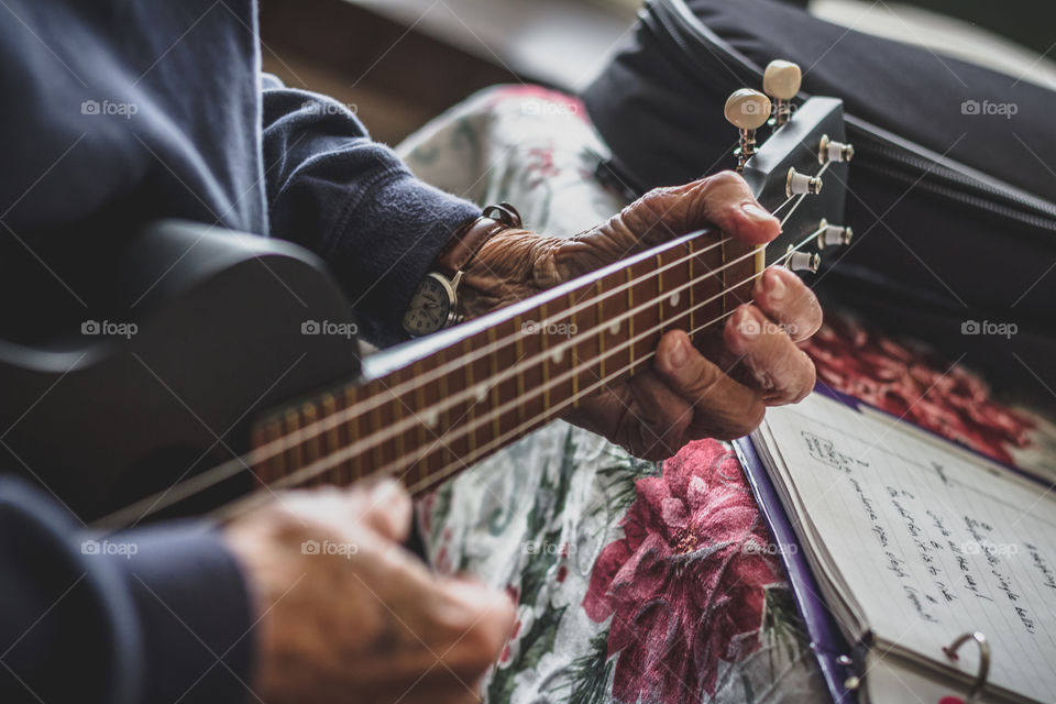 Woman Playing Ukulele