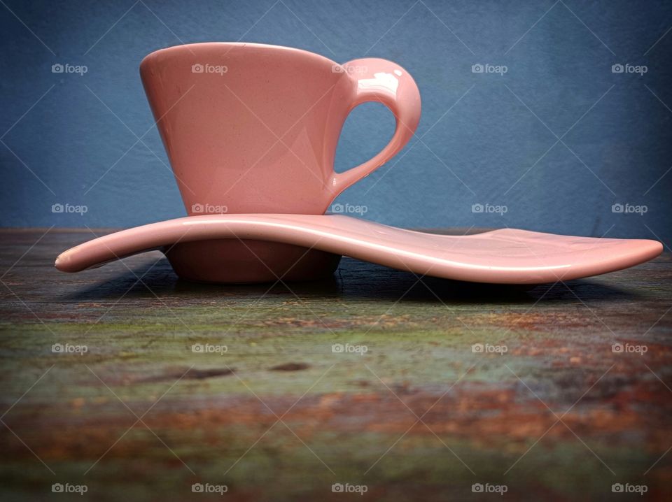 Black coffee in pink cup