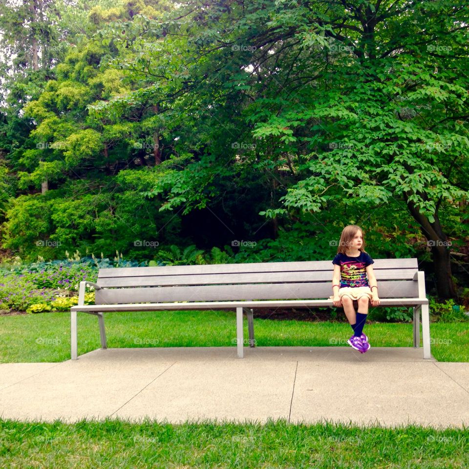 Girl sitting on bench