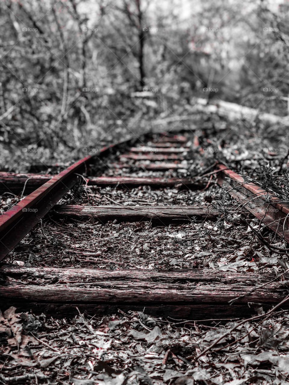 Abandoned red rusty train tracks 