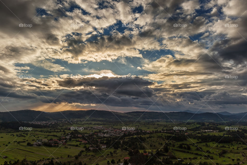 Scenic view of landscape with cloudy sky