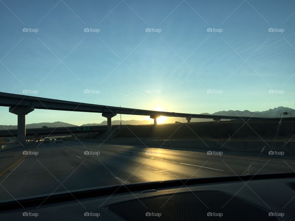 Morning drive. Sunrise on the motorway