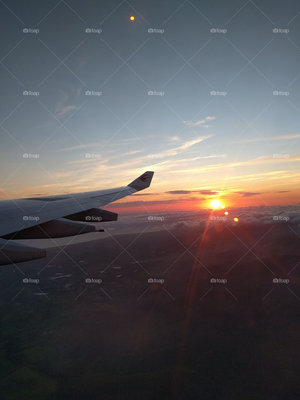Beautiful sunset on airplane