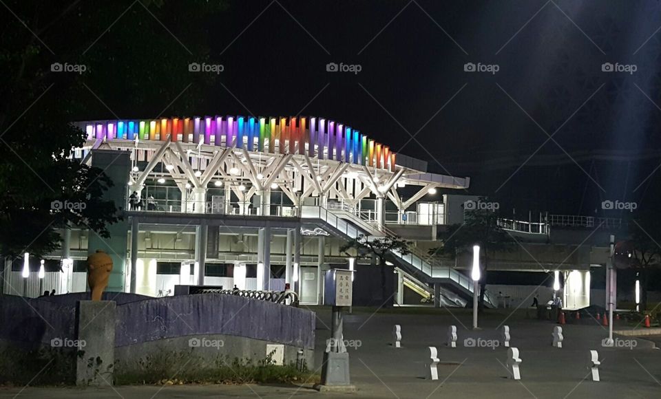 Love Pier Station.It is currently the only elevated station in the Kaohsiung light rail system. night shot . rainbow light