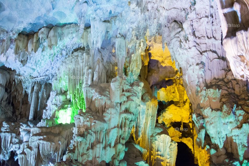 Cave lit with blue and white light
